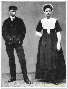 A young man and woman wearing traditional Dutch costume.