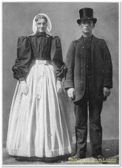 Ducth Bride and Groom in Traditional Dress. The top hat seems to be a foreign influence.