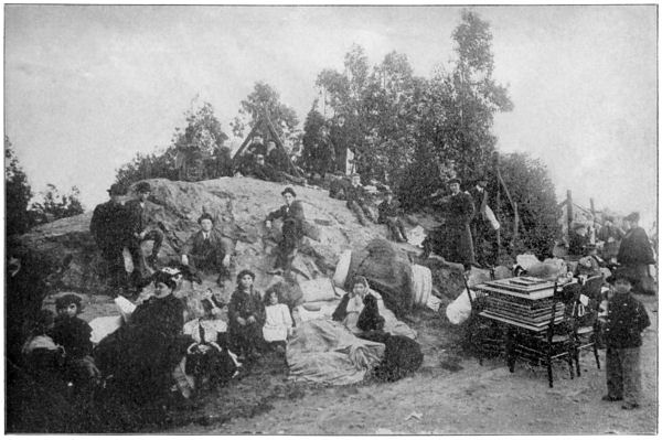 Refugees from the fire that destroyed their homes huddle amid what few possessions they were able to carry away to the safety of Telegraph Hill.