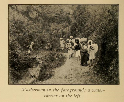 These men are returning from the river where they have washed the clothes.