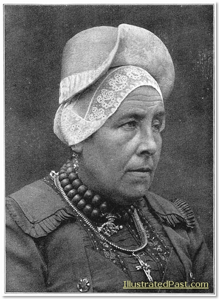 Older woman from West-Friesland in Holland Hull and boat hat.