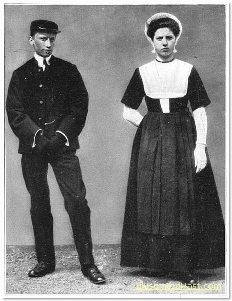 A young man and woman wearing traditional Dutch costume.