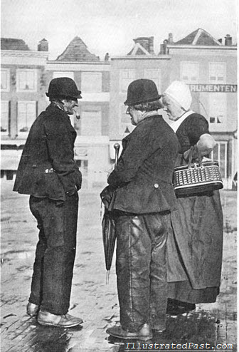 Chatting on a Wet Street in Holland, 1906