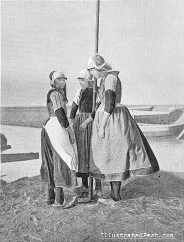 Dutch Girls Perform a Traditional Dance Around a Pole. Is this related to the May Pole?